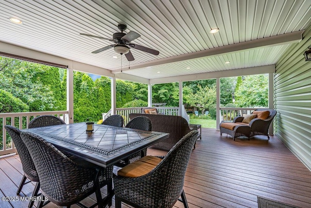 53 Edison Ave, Tinton Falls, NJ 07724 - deck featuring a ceiling fan, an outdoor living space, outdoor dining area, and view of wooded area