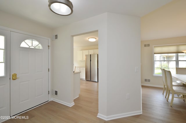 3229 Flagstone Ct, Toms River, NJ 08755 - foyer entrance with light wood finished floors and baseboards