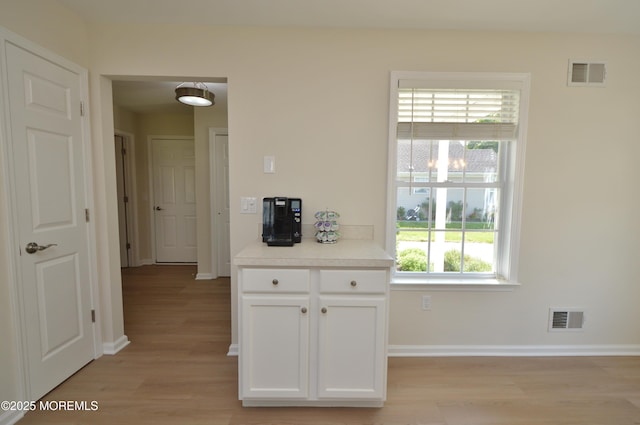 3229 Flagstone Ct, Toms River, NJ 08755 - hallway featuring light wood-style flooring and plenty of natural light