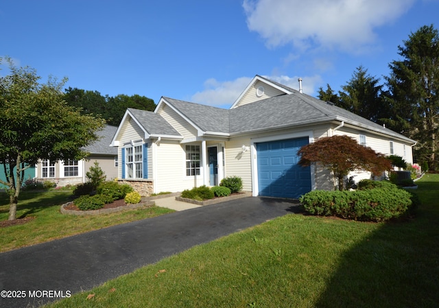 3229 Flagstone Ct, Toms River, NJ 08755 - ranch-style house with a garage, a front yard, roof with shingles, and asphalt driveway