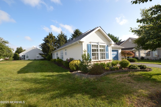 3229 Flagstone Ct, Toms River, NJ 08755 - view of property exterior featuring a yard, an attached garage, stone siding, and driveway