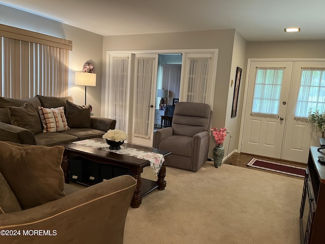 805 Westminster Ct Unit A, Manchester, NJ 08759 - carpeted living area featuring french doors and baseboards