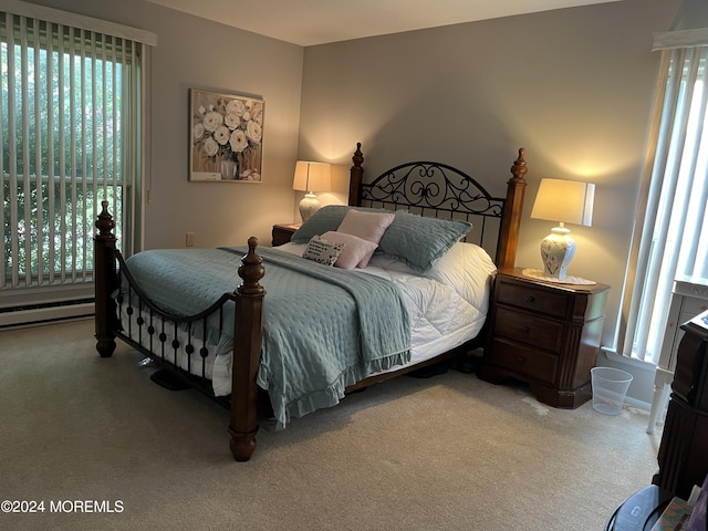 805 Westminster Ct Unit A, Manchester, NJ 08759 - carpeted bedroom featuring multiple windows and a baseboard heating unit
