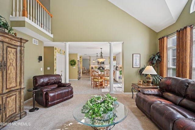 21 Orchid Ln, Barnegat, NJ 08005 - living area with ornate columns, high vaulted ceiling, and light carpet