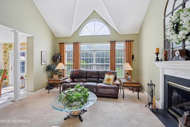 21 Orchid Ln, Barnegat, NJ 08005 - living area with decorative columns, carpet flooring, a fireplace with flush hearth, and high vaulted ceiling