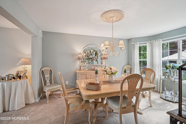 21 Orchid Ln, Barnegat, NJ 08005 - dining space with light colored carpet and a chandelier