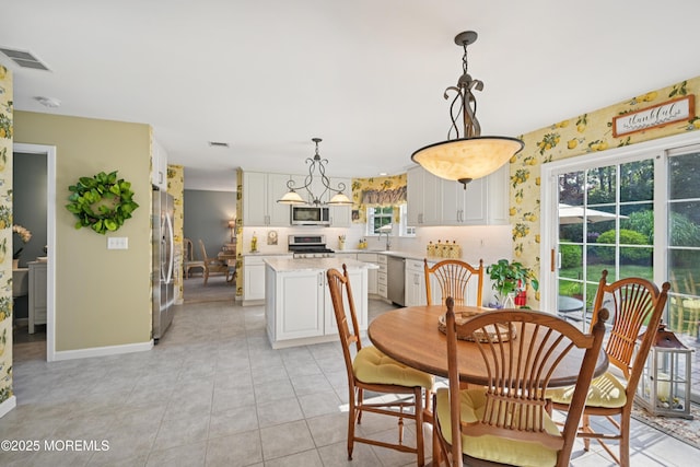 21 Orchid Ln, Barnegat, NJ 08005 - dining space with baseboards and light tile patterned flooring