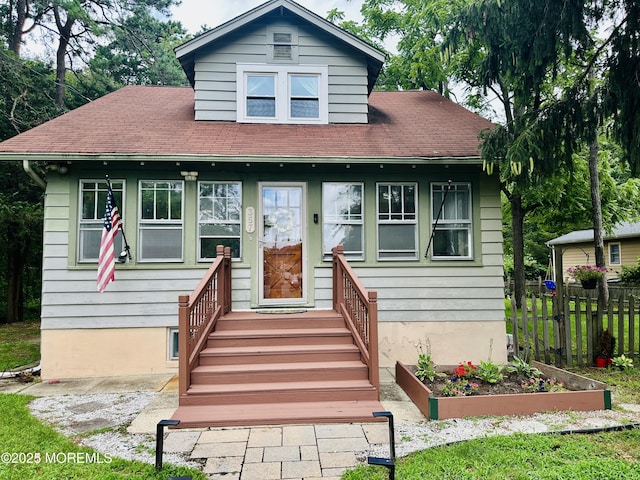 357 Boland Ave, Brick, NJ 08724 - bungalow-style house featuring a vegetable garden and roof with shingles
