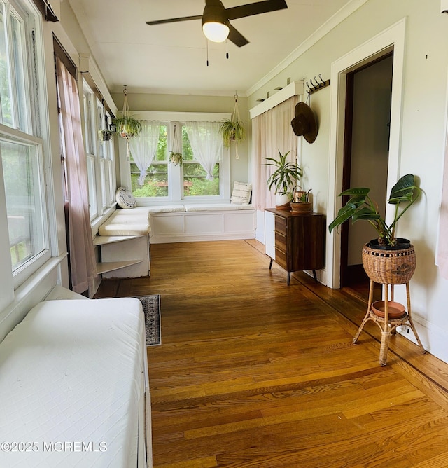 357 Boland Ave, Brick, NJ 08724 - sunroom with plenty of natural light, wood finished floors, and crown molding