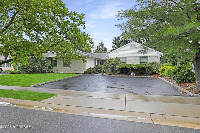 4 Dawn Way, Aberdeen, NJ 07747 - ranch-style home featuring driveway, a front lawn, and brick siding