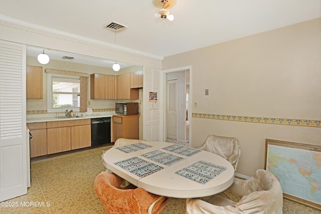 4 Dawn Way, Aberdeen, NJ 07747 - kitchen with black appliances, light countertops, a breakfast bar area, light brown cabinetry, and light floors