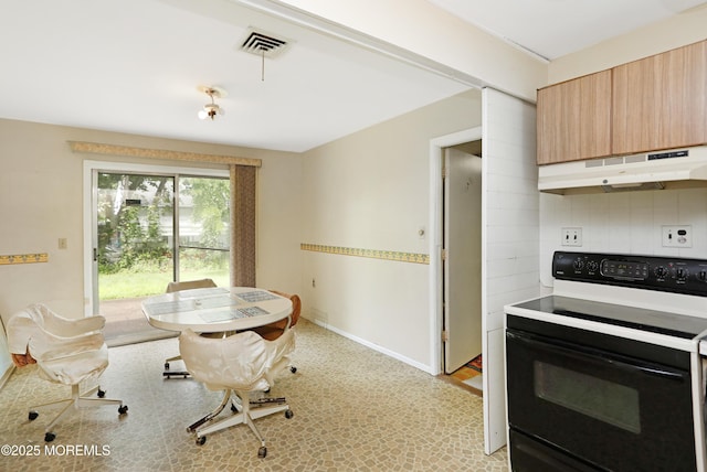4 Dawn Way, Aberdeen, NJ 07747 - kitchen featuring range with electric cooktop, under cabinet range hood, light brown cabinetry, modern cabinets, and backsplash