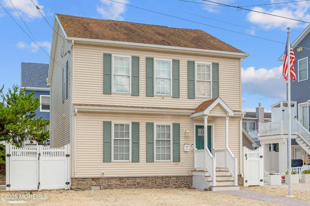 315 Shuster Ave, Ortley Beach, NJ 08751 - view of front facade with a gate