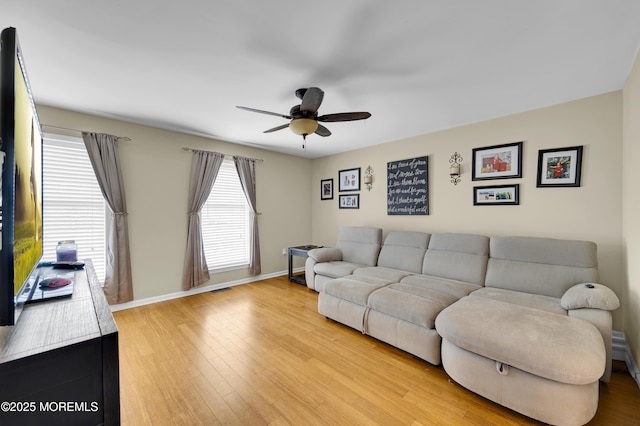 315 Shuster Ave, Ortley Beach, NJ 08751 - living room featuring ceiling fan and light wood-type flooring