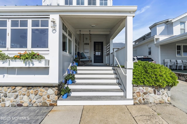 900 Ocean Ave, Bradley Beach, NJ 07720 - doorway to property featuring a porch