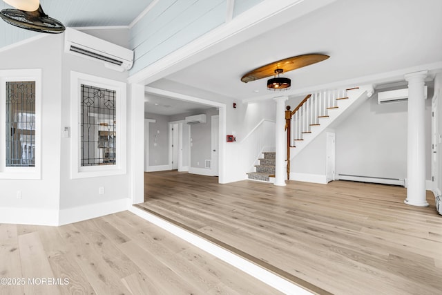 900 Ocean Ave, Bradley Beach, NJ 07720 - unfurnished living room featuring a wall unit AC, a baseboard radiator, stairs, and light wood finished floors