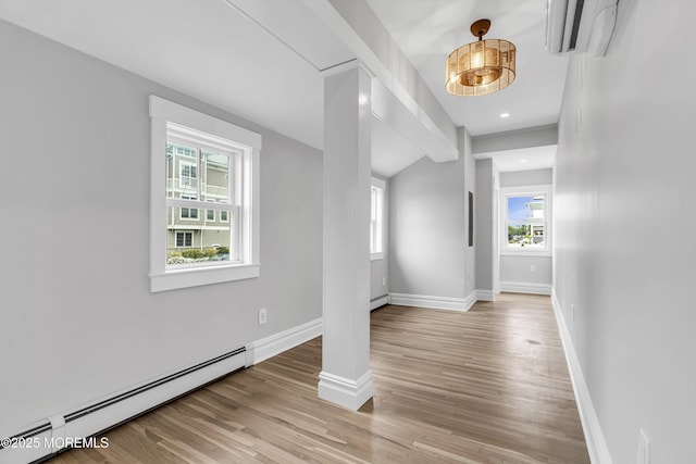 900 Ocean Ave, Bradley Beach, NJ 07720 - foyer with baseboard heating, a wall unit AC, wood finished floors, and recessed lighting