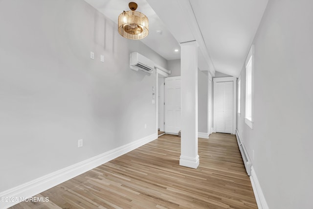 900 Ocean Ave, Bradley Beach, NJ 07720 - interior space with an AC wall unit, a baseboard radiator, light wood-style floors, and recessed lighting