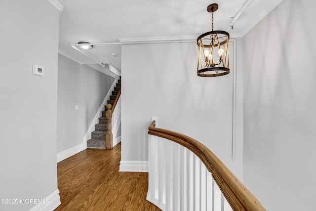 900 Ocean Ave, Bradley Beach, NJ 07720 - stairway with a chandelier, crown molding, and wood finished floors