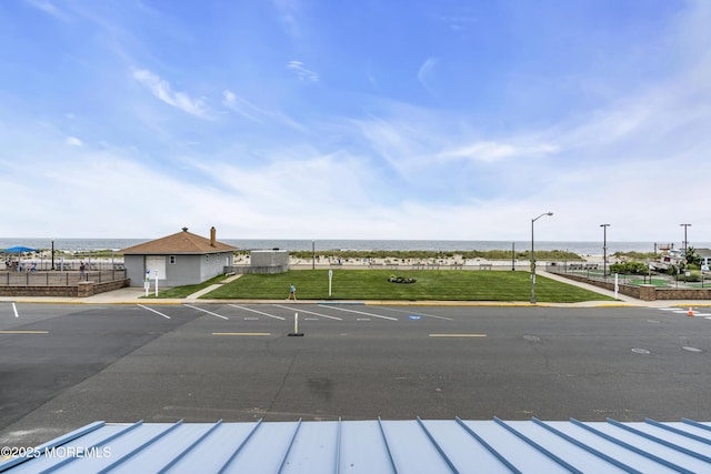 900 Ocean Ave, Bradley Beach, NJ 07720 - uncovered parking lot featuring a water view