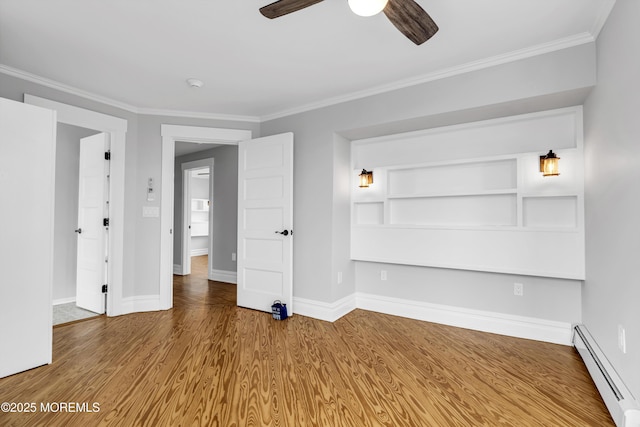 900 Ocean Ave, Bradley Beach, NJ 07720 - spare room featuring a baseboard radiator, a ceiling fan, crown molding, wood finished floors, and a smoke detector