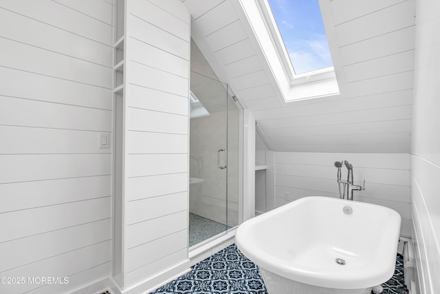 900 Ocean Ave, Bradley Beach, NJ 07720 - bathroom with lofted ceiling, a soaking tub, a stall shower, and a skylight