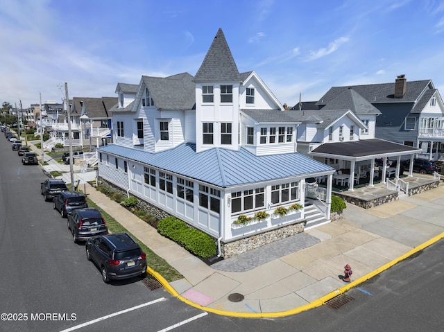 900 Ocean Ave, Bradley Beach, NJ 07720 - view of building exterior with a residential view