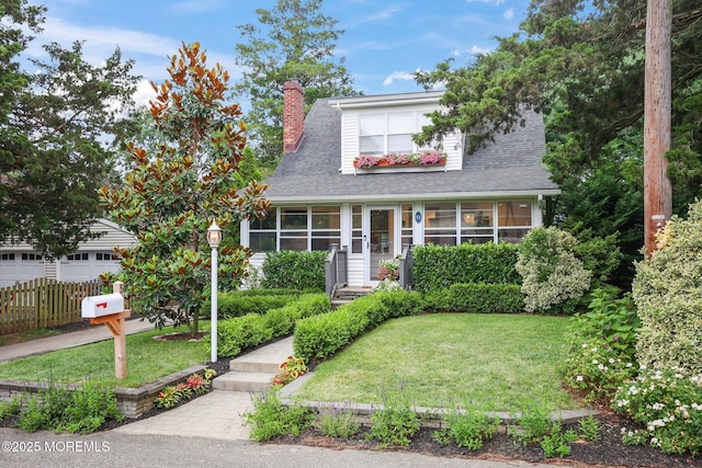 51 Burdge Ave, Brick, NJ 08724 - view of front facade with a chimney and a shingled roof