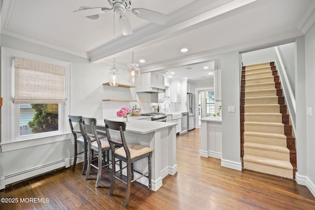 51 Burdge Ave, Brick, NJ 08724 - kitchen featuring a baseboard radiator, light countertops, white cabinets, dark wood-type flooring, and ornamental molding