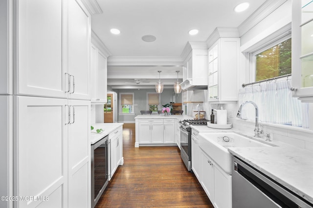 51 Burdge Ave, Brick, NJ 08724 - kitchen with appliances with stainless steel finishes, beverage cooler, white cabinetry, recessed lighting, and crown molding