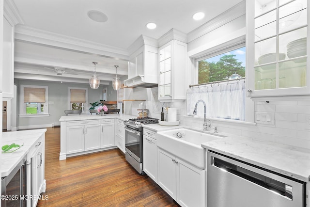 51 Burdge Ave, Brick, NJ 08724 - kitchen with stainless steel appliances, a peninsula, beverage cooler, white cabinets, and crown molding
