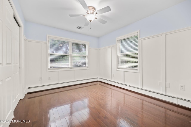 51 Burdge Ave, Brick, NJ 08724 - unfurnished bedroom with a decorative wall, hardwood / wood-style flooring, a ceiling fan, and a wainscoted wall