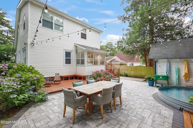 51 Burdge Ave, Brick, NJ 08724 - view of patio with outdoor dining space, a deck, a sunroom, and a swimming pool