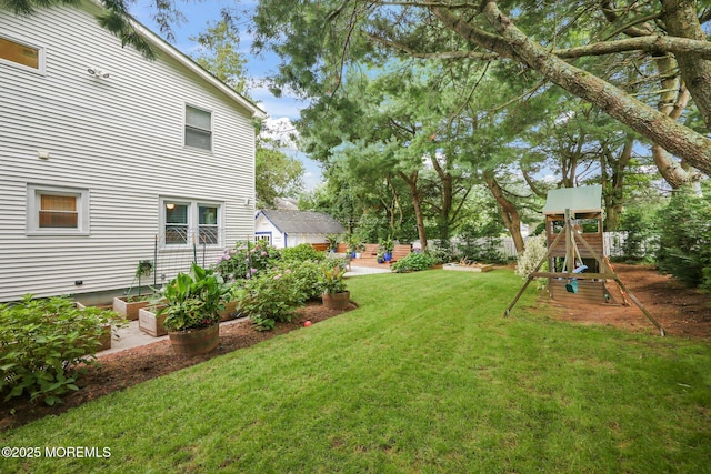 51 Burdge Ave, Brick, NJ 08724 - view of green lawn with a playground and a patio