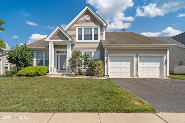 98 Mirage Blvd, Barnegat, NJ 08005 - view of front of property featuring driveway, a front lawn, a garage, and roof with shingles