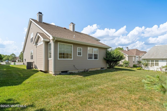 98 Mirage Blvd, Barnegat, NJ 08005 - back of house featuring a yard and a chimney