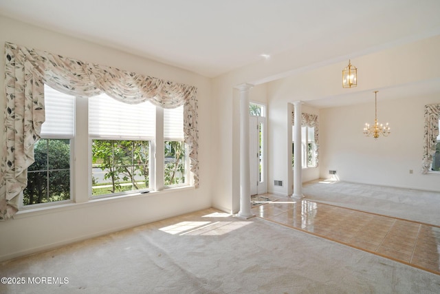 98 Mirage Blvd, Barnegat, NJ 08005 - empty room with decorative columns, carpet floors, and a chandelier