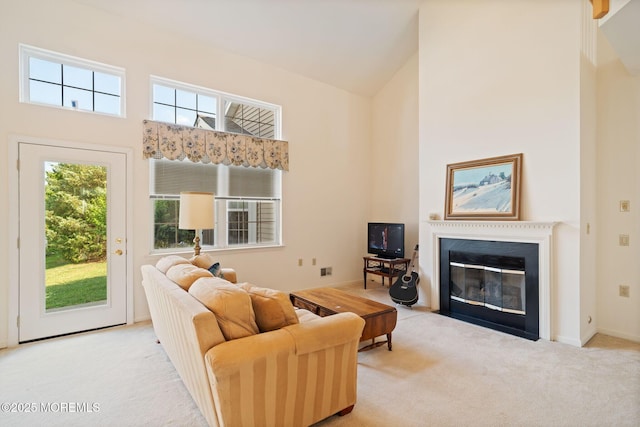 98 Mirage Blvd, Barnegat, NJ 08005 - carpeted living room with high vaulted ceiling and a fireplace with flush hearth
