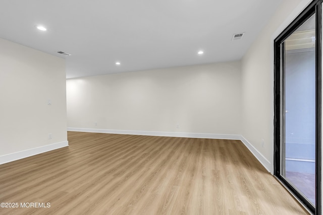 104 Dundee Ct, Aberdeen, NJ 07747 - empty room featuring light wood finished floors and recessed lighting
