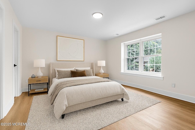 104 Dundee Ct, Aberdeen, NJ 07747 - bedroom with wood finished floors and baseboards