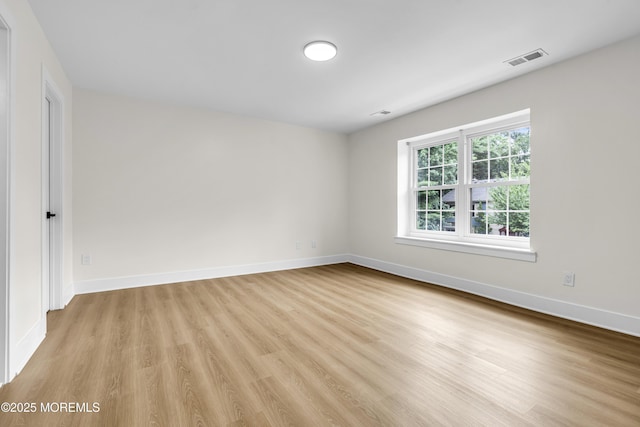 104 Dundee Ct, Aberdeen, NJ 07747 - unfurnished room featuring light wood finished floors and baseboards