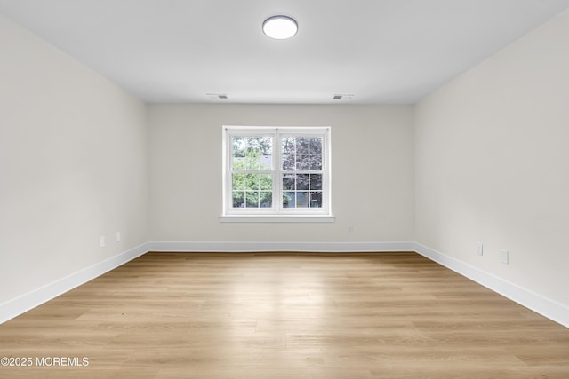 104 Dundee Ct, Aberdeen, NJ 07747 - empty room featuring light wood-style floors