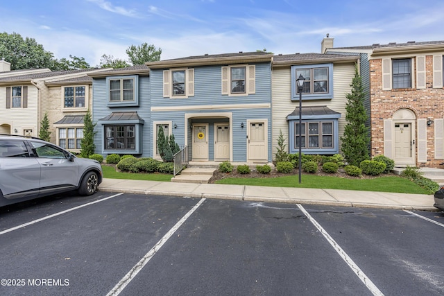 104 Dundee Ct, Aberdeen, NJ 07747 - traditional-style house with uncovered parking and a chimney