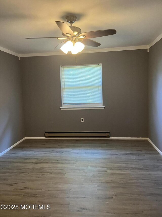 6D Potomac Ln, Manchester, NJ 08759 - empty room with crown molding, a ceiling fan, wood finished floors, and baseboard heating