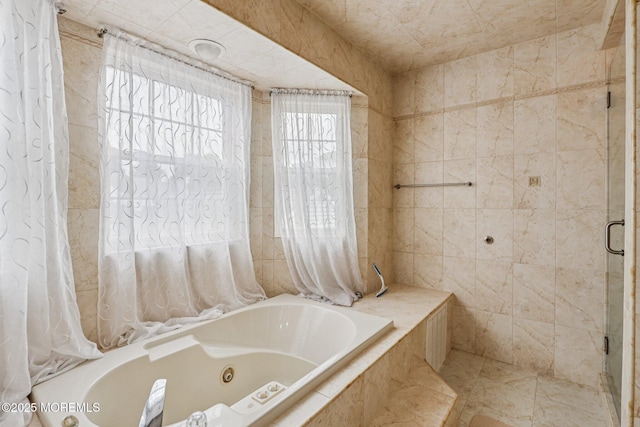 149 Jefferson Dr, Ocean Twp, NJ 07712 - bathroom featuring a tub with jets, a stall shower, and tile walls
