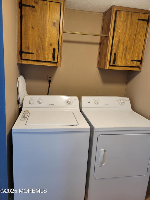 1881 Rte 37 Unit 347, Toms River, NJ 08757 - laundry room featuring cabinet space and washer and clothes dryer