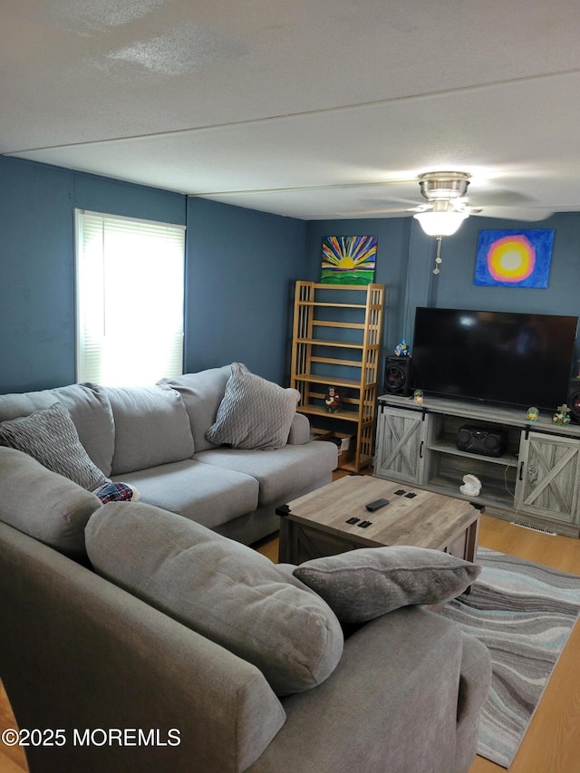 1881 Rte 37 Unit 347, Toms River, NJ 08757 - living area featuring wood finished floors and a ceiling fan