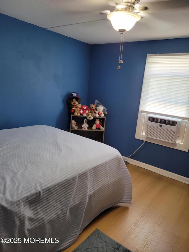 1881 Rte 37 Unit 347, Toms River, NJ 08757 - bedroom with wood finished floors, cooling unit, and ceiling fan