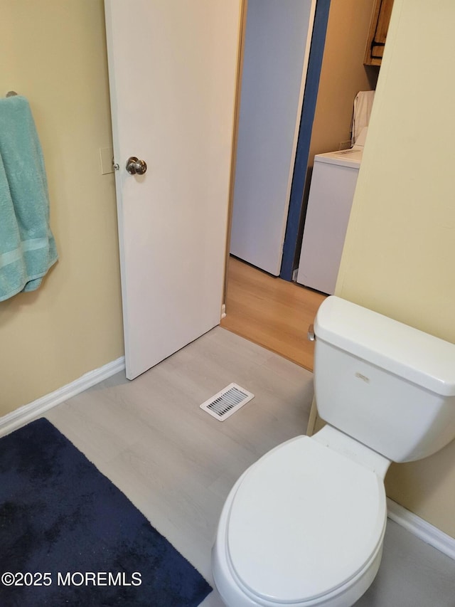 1881 Rte 37 Unit 347, Toms River, NJ 08757 - bathroom featuring wood finished floors and washer / dryer
