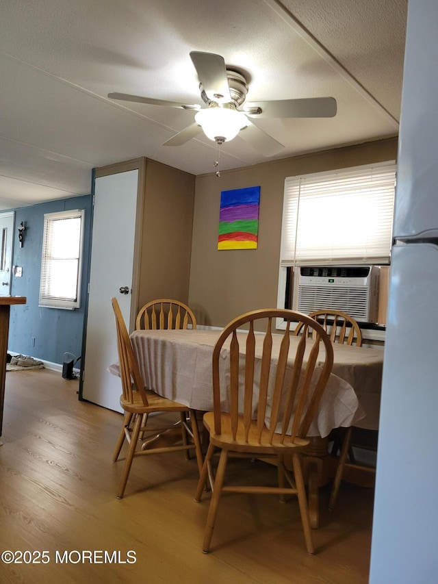1881 Rte 37 Unit 347, Toms River, NJ 08757 - dining space with cooling unit, light wood finished floors, and ceiling fan